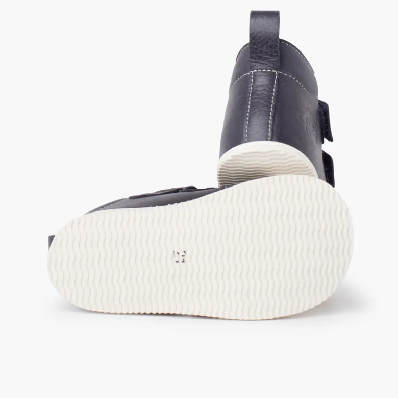 Botita piel sport puntera blanca