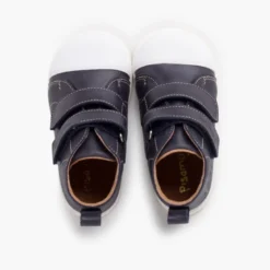 Botita piel sport puntera blanca