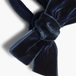 Coletero con lazo terciopelo para niñas