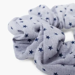 Coletero tela estrellitas