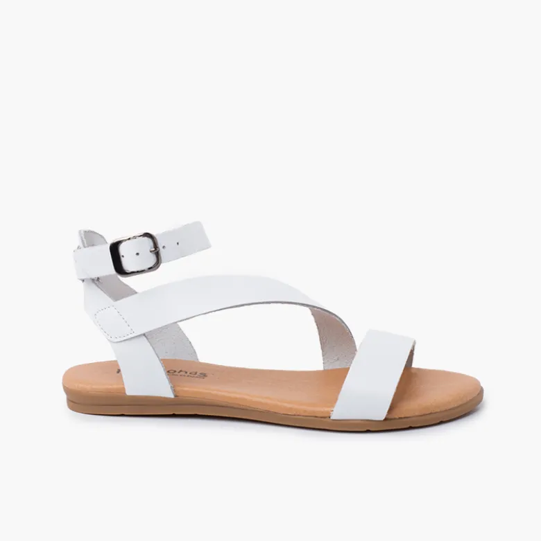 Sandalias niña y mujer tira cruzada pulsera hebilla